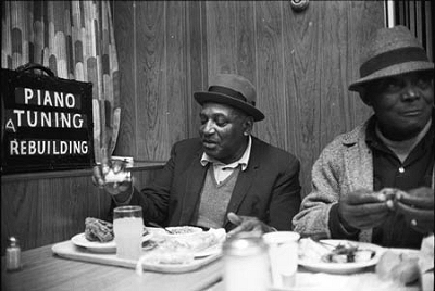 Houston Stackhouse and Hacksaw Harney at Memphis Diner in '69. Hacksaw never left home without his repair kit (at left); source: http://www.adelphirecords.com/blues/9909.html; photographer's name not given, actually Gayle / G.L. Moore