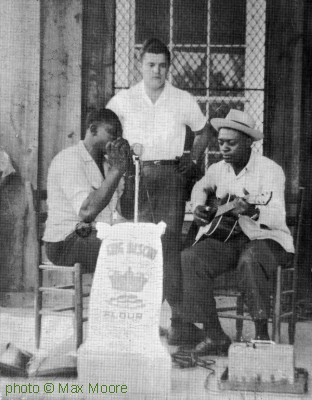Sonny Boy Williamson & R O B E R T   L O C K W O O D, 1941, playing the King Biscuit Time show, advertising the King Biscuit brand of baking flour on radio station KFFA in Helena, Arkansas; source: Juke Blues 20 (Summer 1990), p. 33; photographer: Max Moore; a bit photoshop processed by Stefan Wirz
